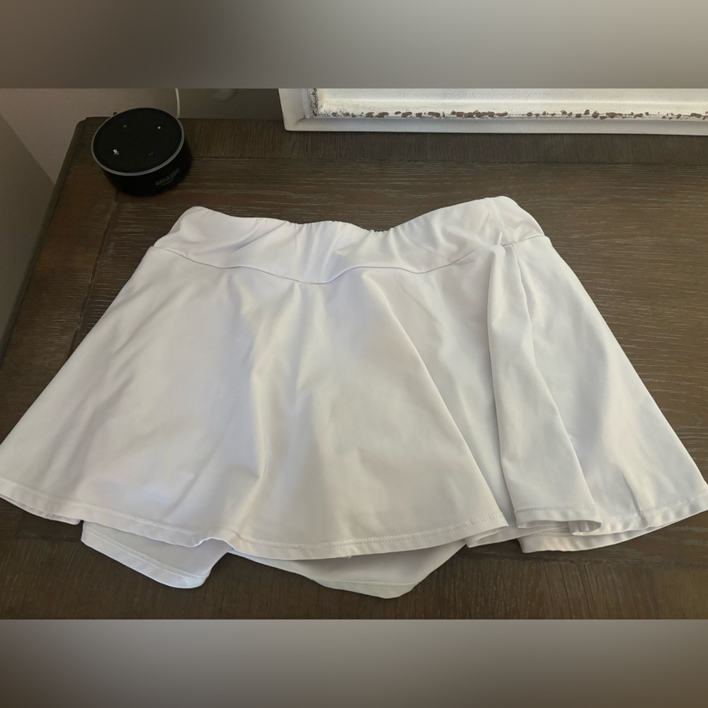 White mini tennis skirt